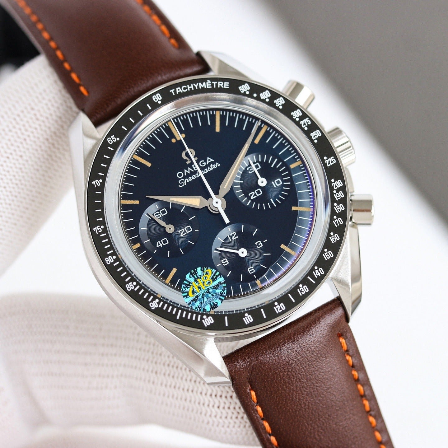 Stainless Steel Omega Speedmaster on Brown Leather Strap
