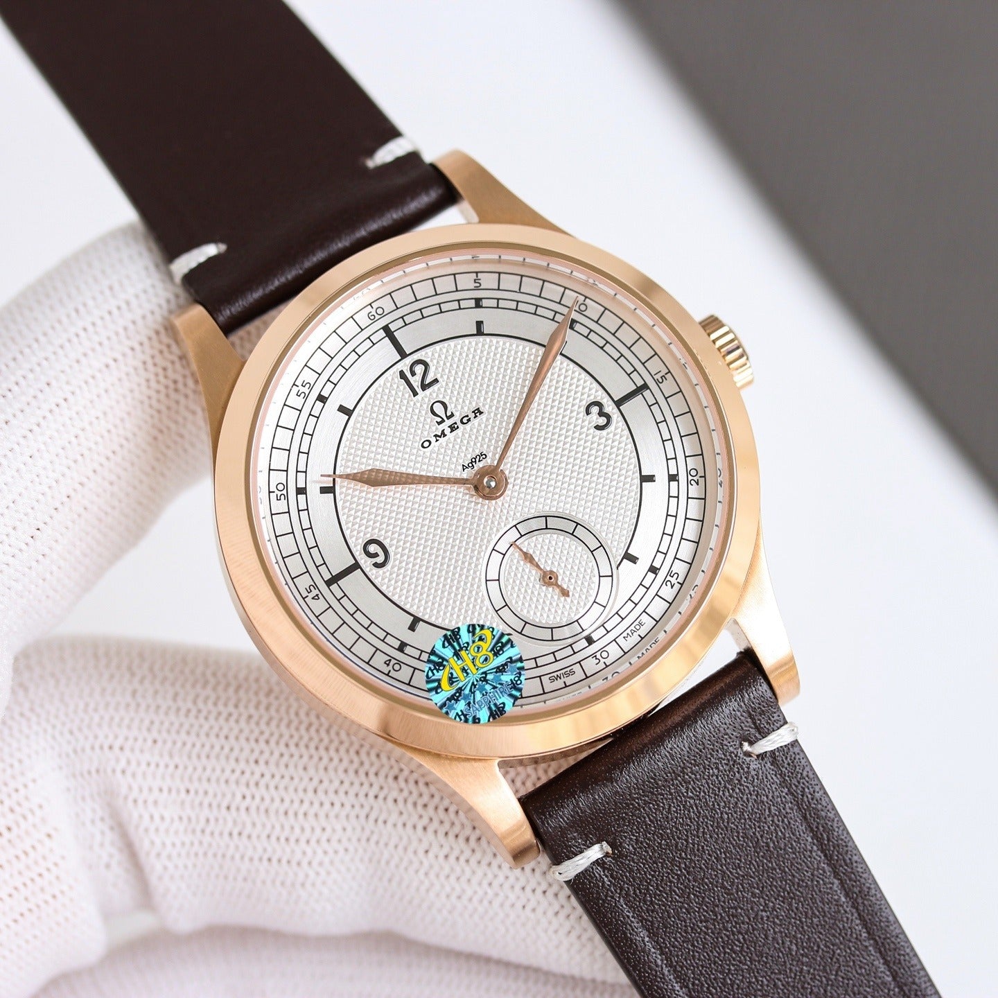 Omega with Railroad Track Minuterie and Brown Leather Strap