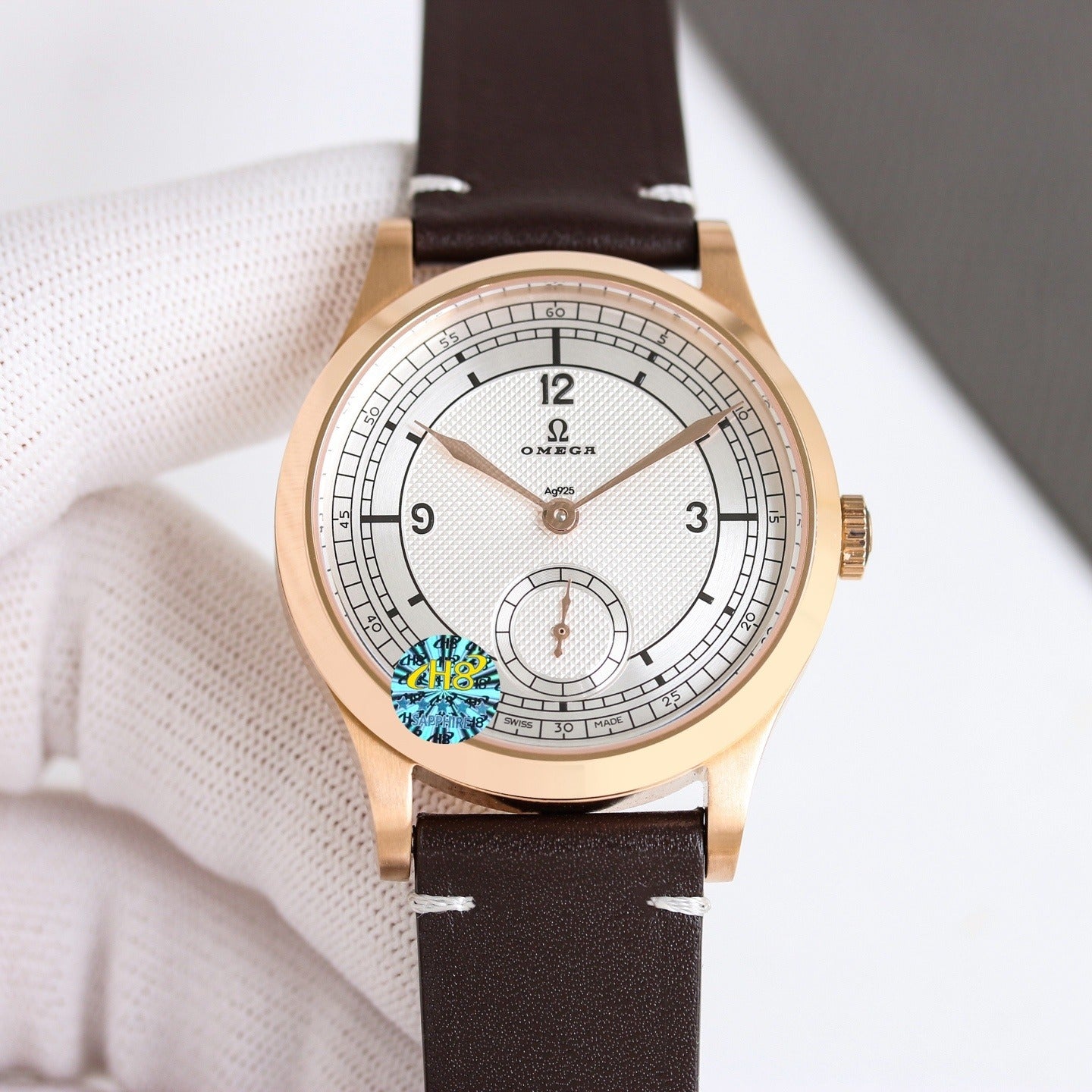 Omega with Railroad Track Minuterie and Brown Leather Strap