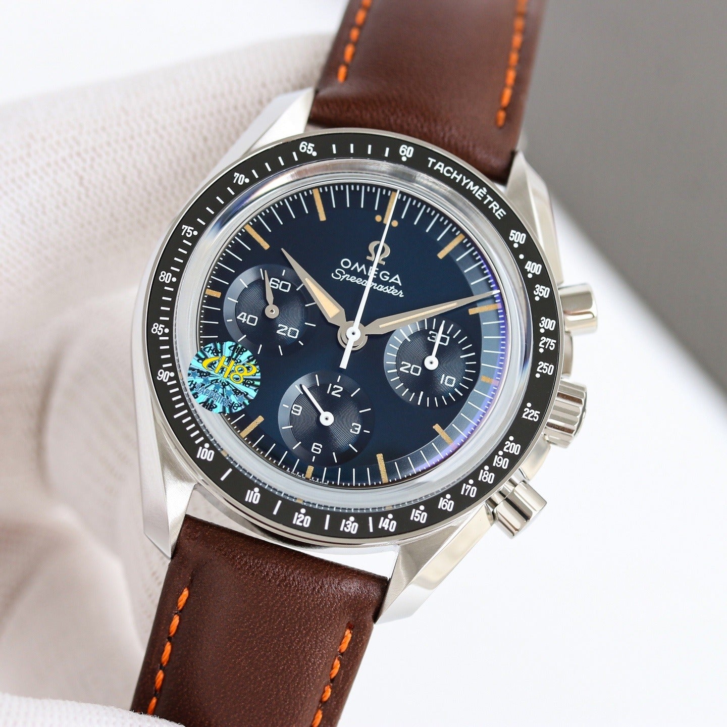 Stainless Steel Omega Speedmaster on Brown Leather Strap