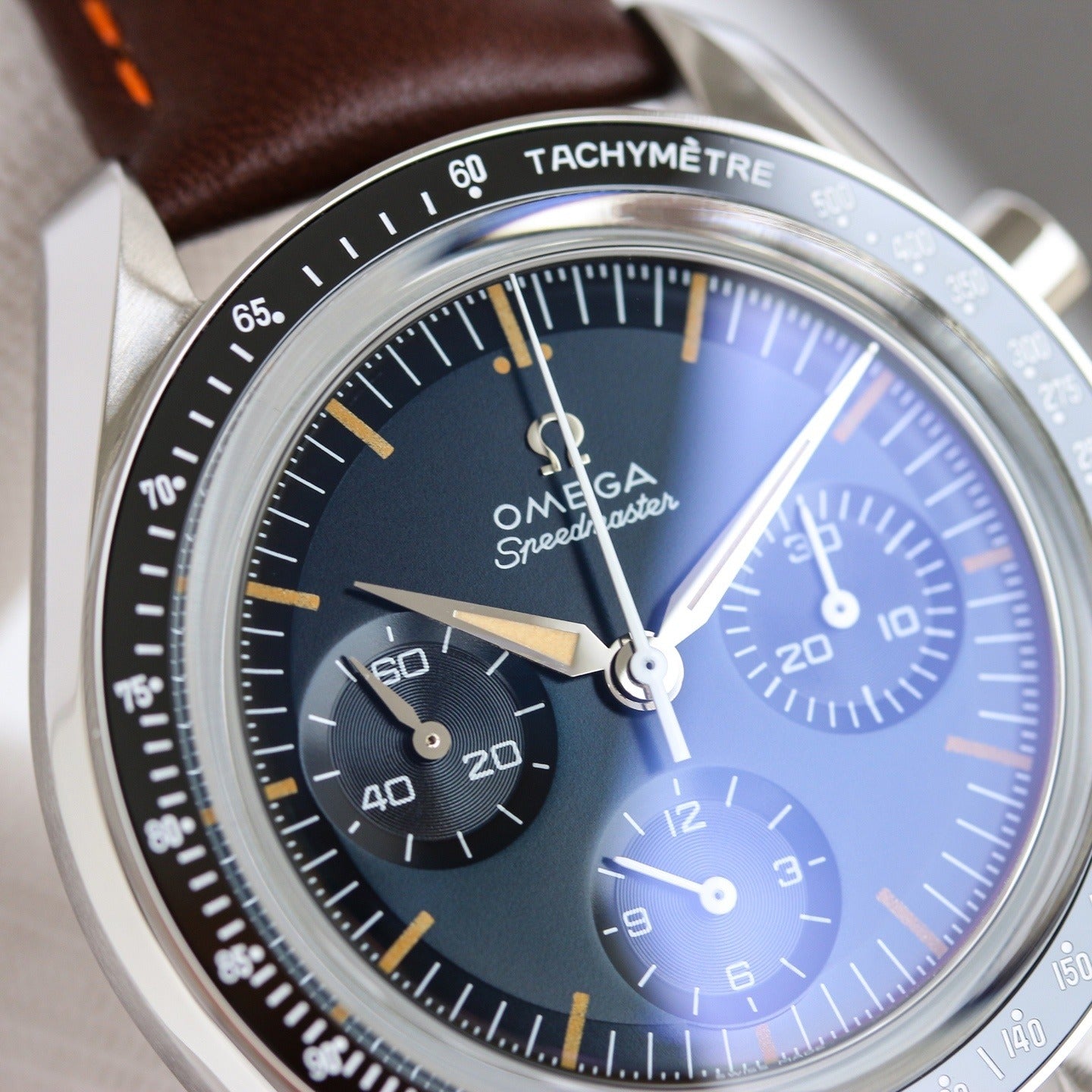 Stainless Steel Omega Speedmaster on Brown Leather Strap