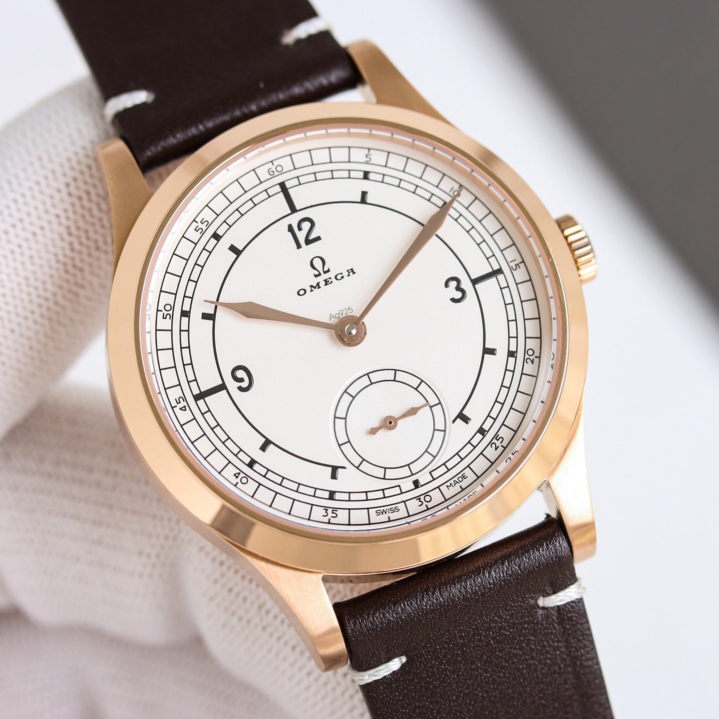 Omega with Railroad Track Minuterie and Brown Leather Strap