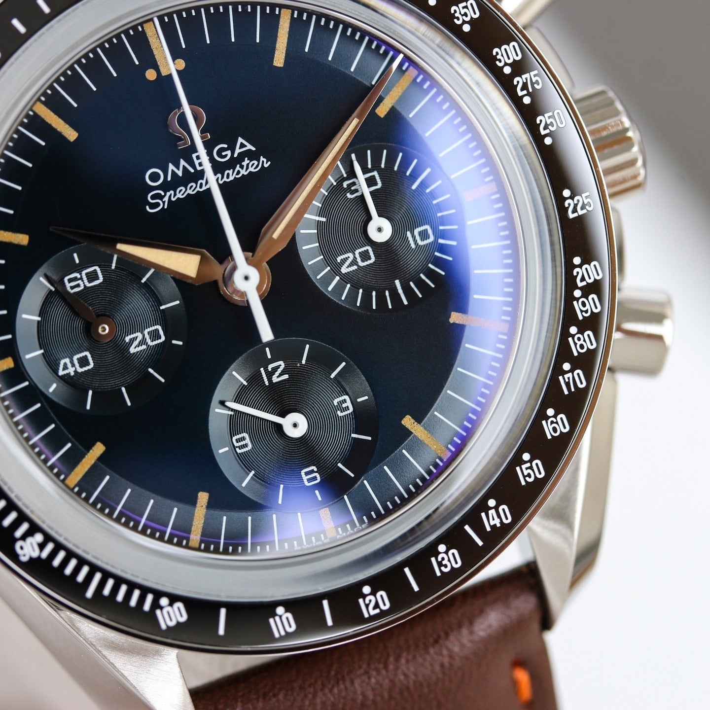 Stainless Steel Omega Speedmaster on Brown Leather Strap
