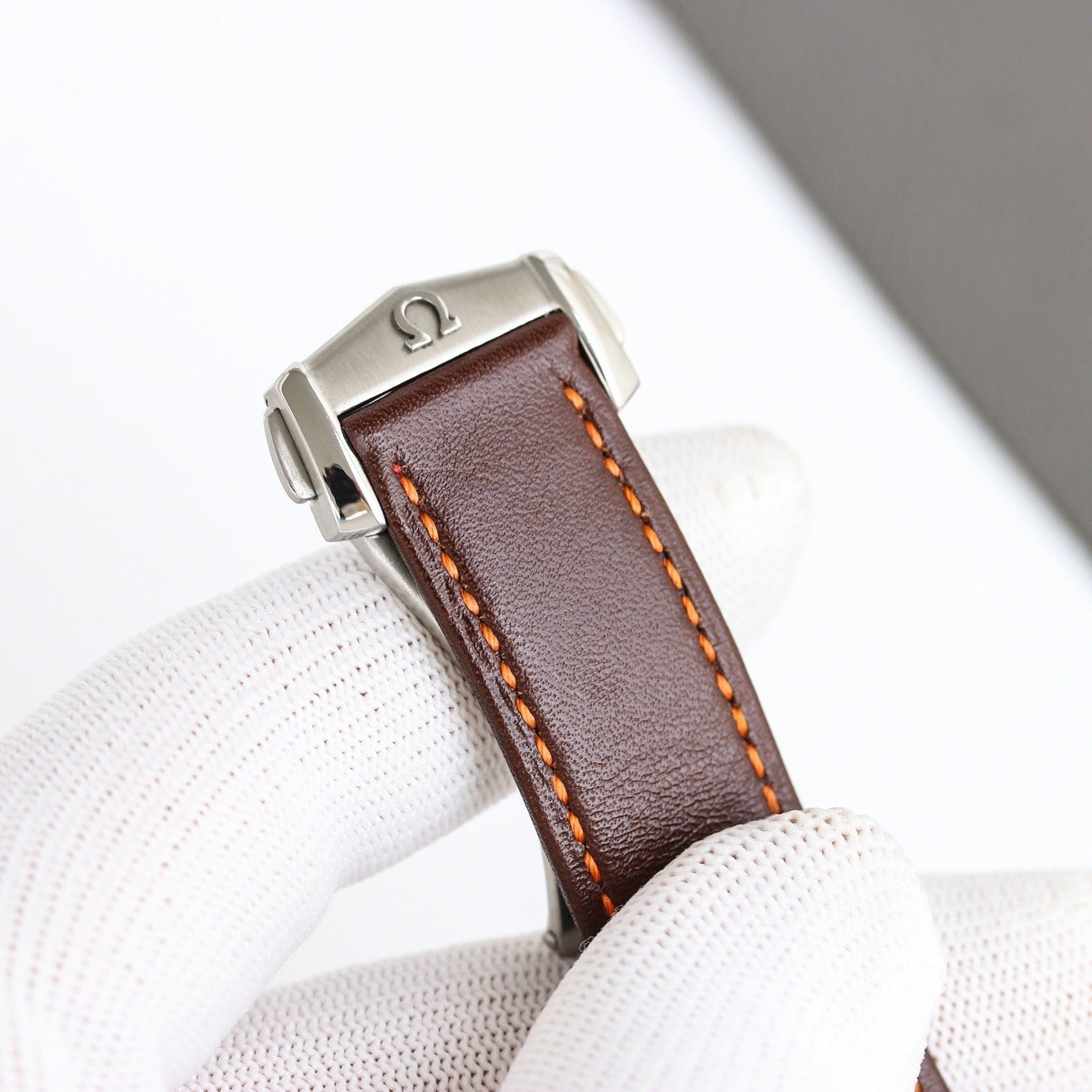 Stainless Steel Omega Speedmaster on Brown Leather Strap