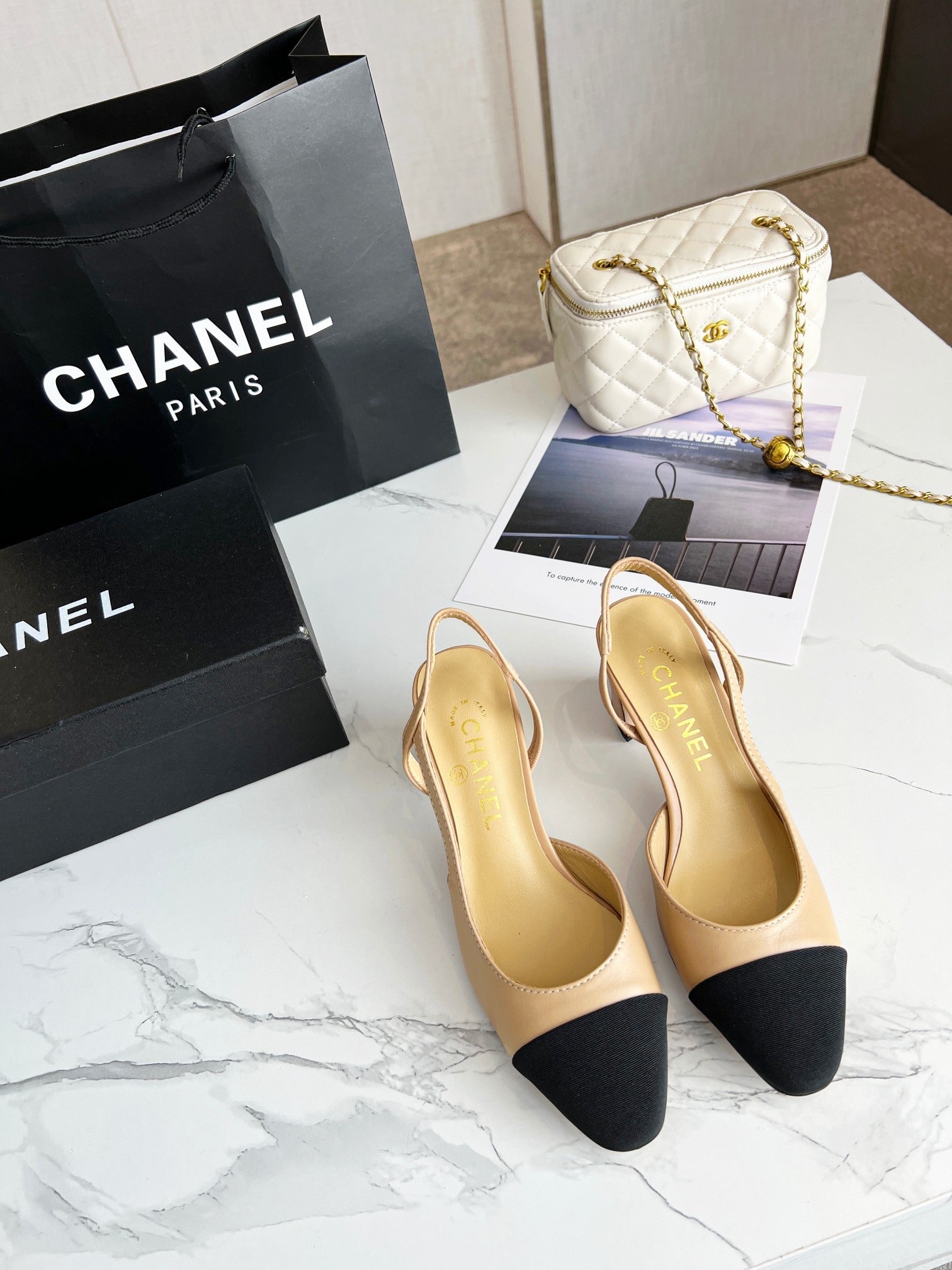 Chanel Beige & Black Cap-Toe Slingback Heels