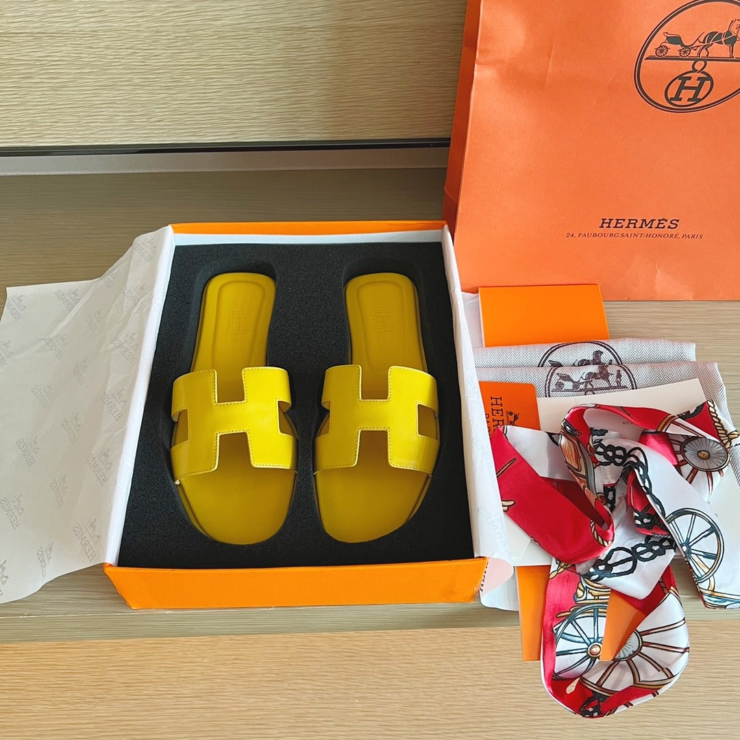 Hermès Oran Sandals in Yellow Leather with Iconic H Cut-Out