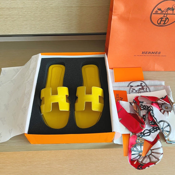 Hermès Oran Sandals in Yellow Leather with Iconic H Cut-Out