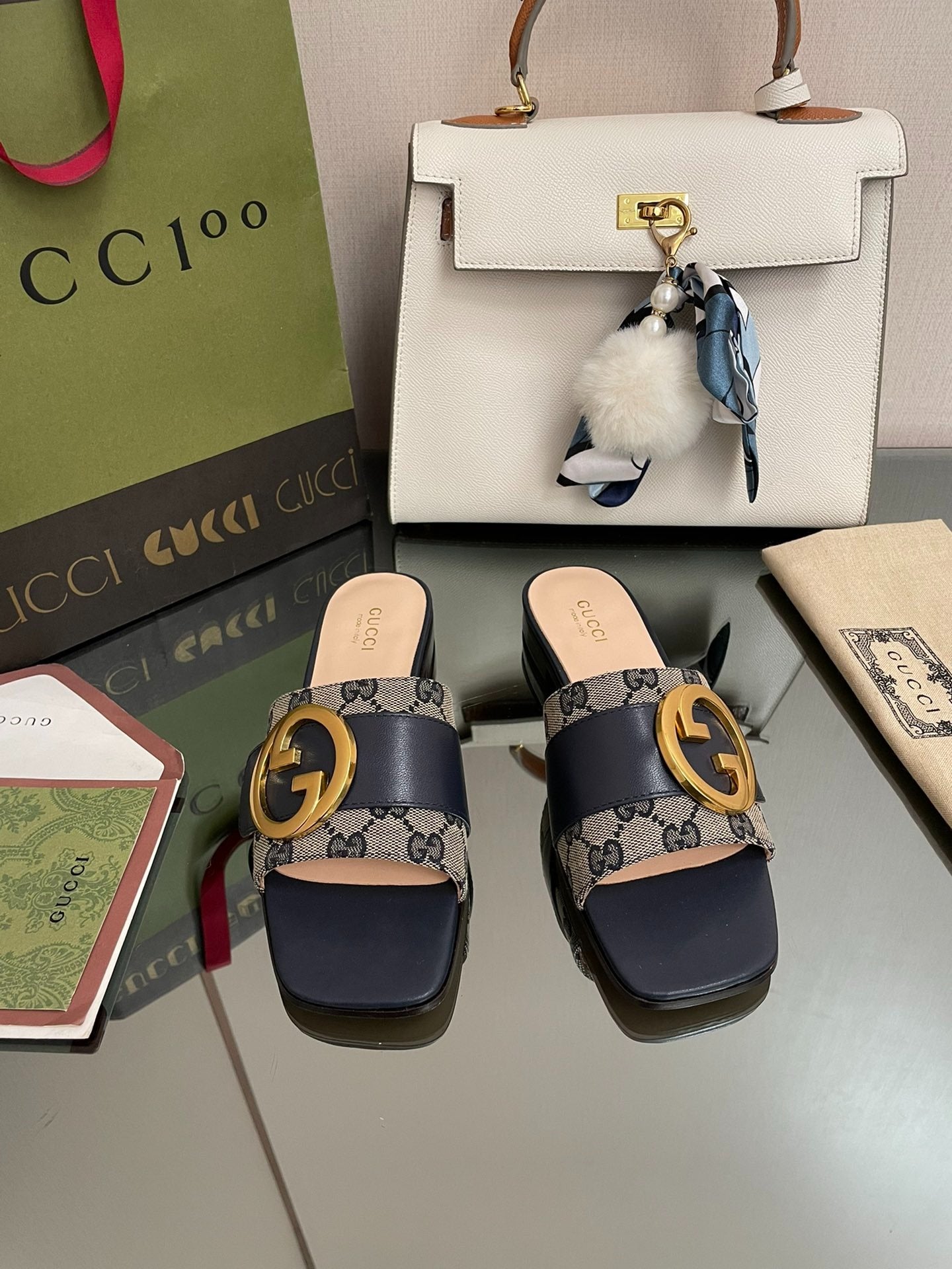 Gucci GG Canvas & Navy Leather Interlocking G Logo Mules