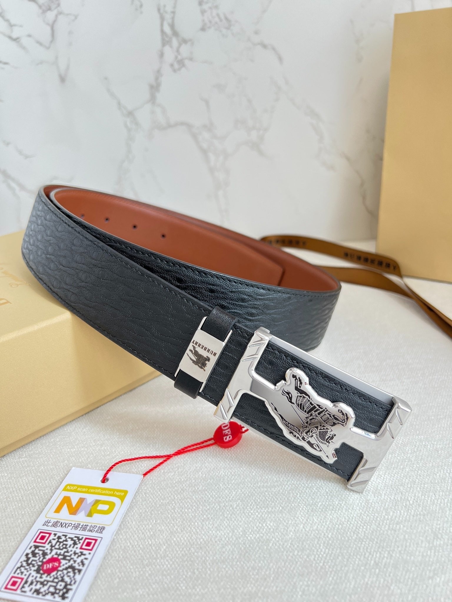 Stylish Black Leather Belt with Metallic Horse Emblem Buckle