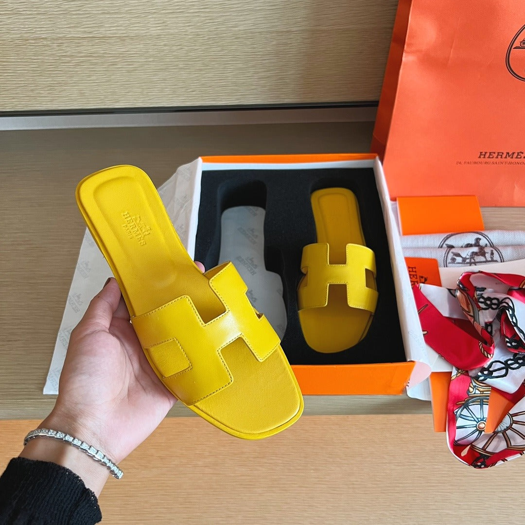 Hermès Oran Sandals in Yellow Leather with Iconic H Cut-Out