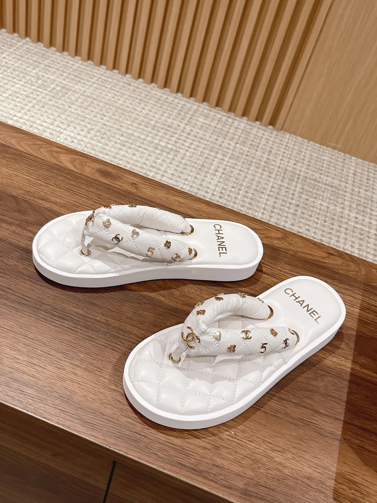 Chanel White Quilted Thong Sandals with Gold CC Charms
