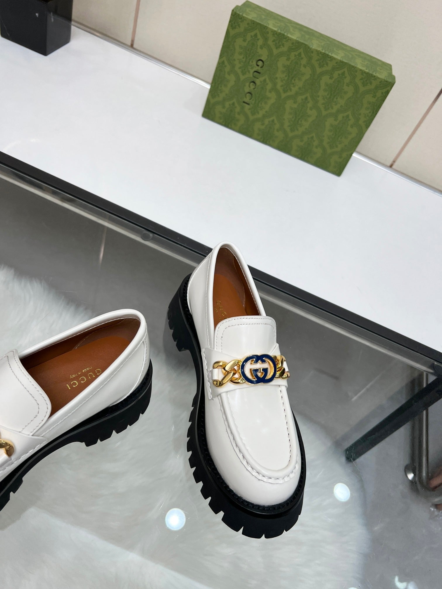 Gucci White Leather Lug Sole Loafers with Interlocking G Chain Detail