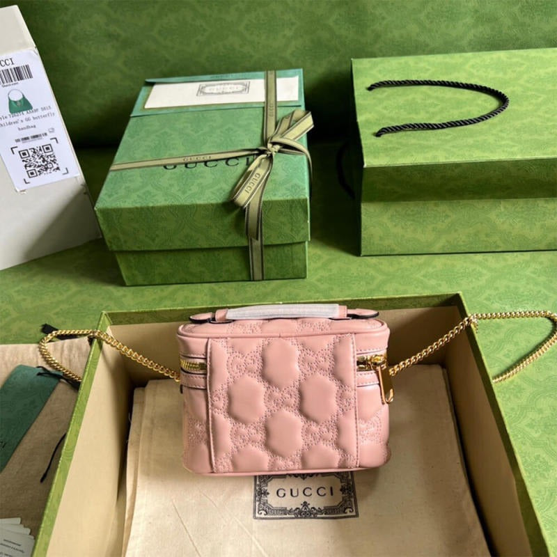 GG Matelassé top handle mini bag