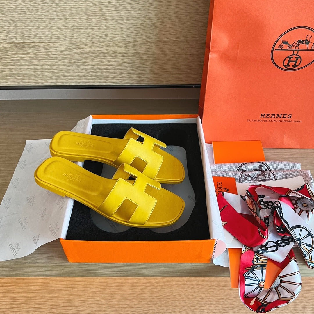 Hermès Oran Sandals in Yellow Leather with Iconic H Cut-Out