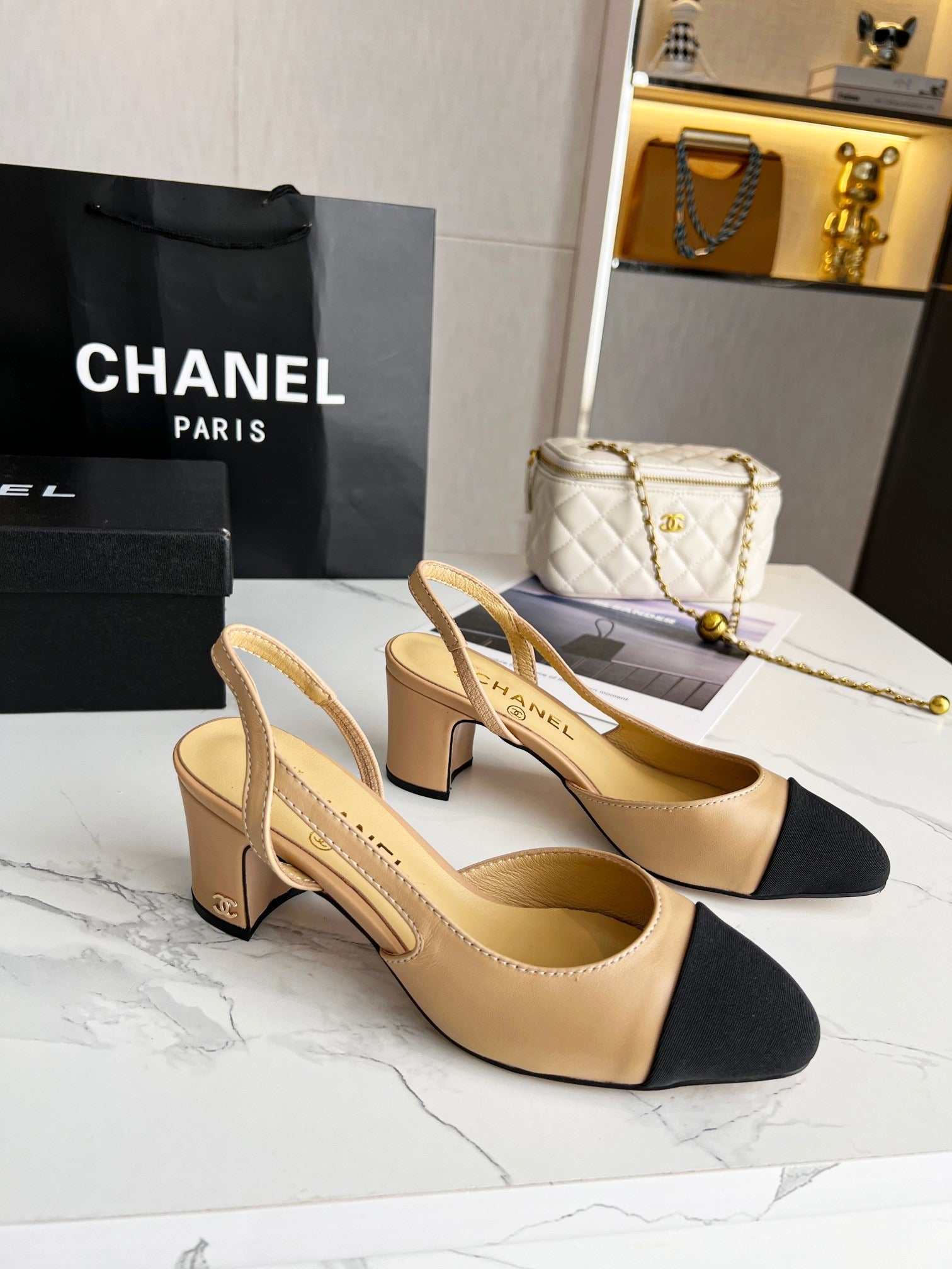 Chanel Beige & Black Cap-Toe Slingback Heels
