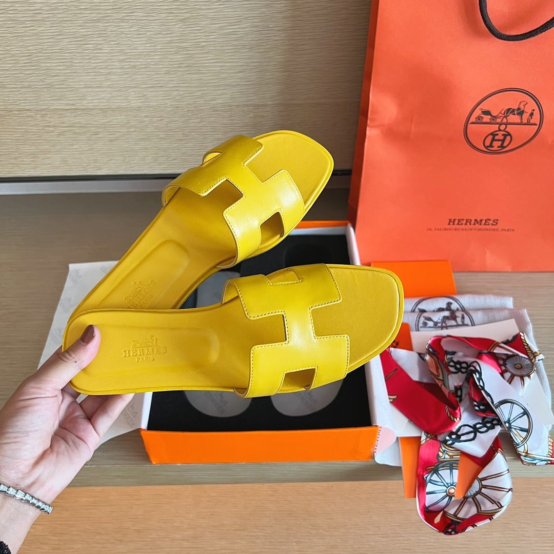 Hermès Oran Sandals in Yellow Leather with Iconic H Cut-Out