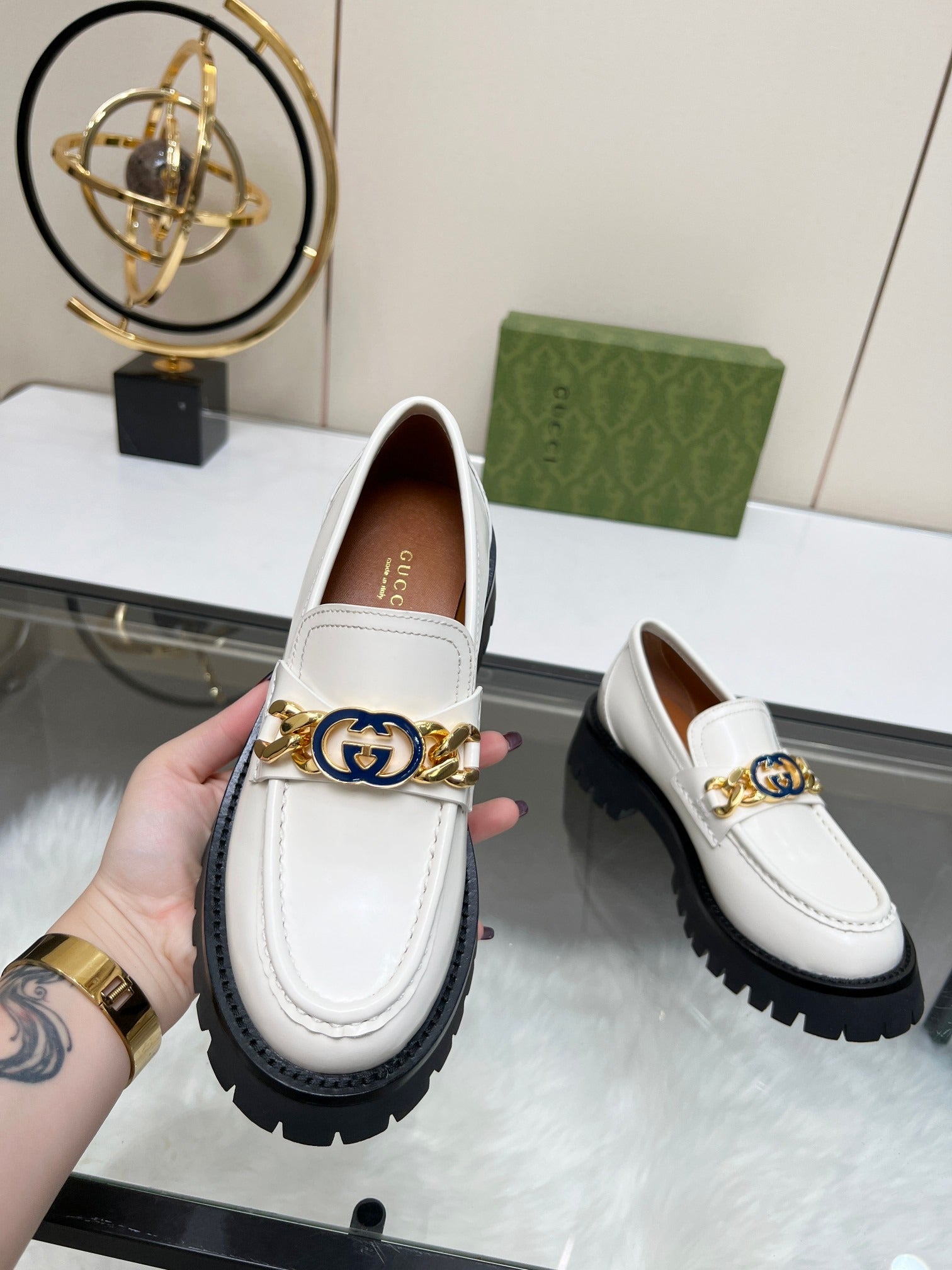 Gucci White Leather Lug Sole Loafers with Interlocking G Chain Detail