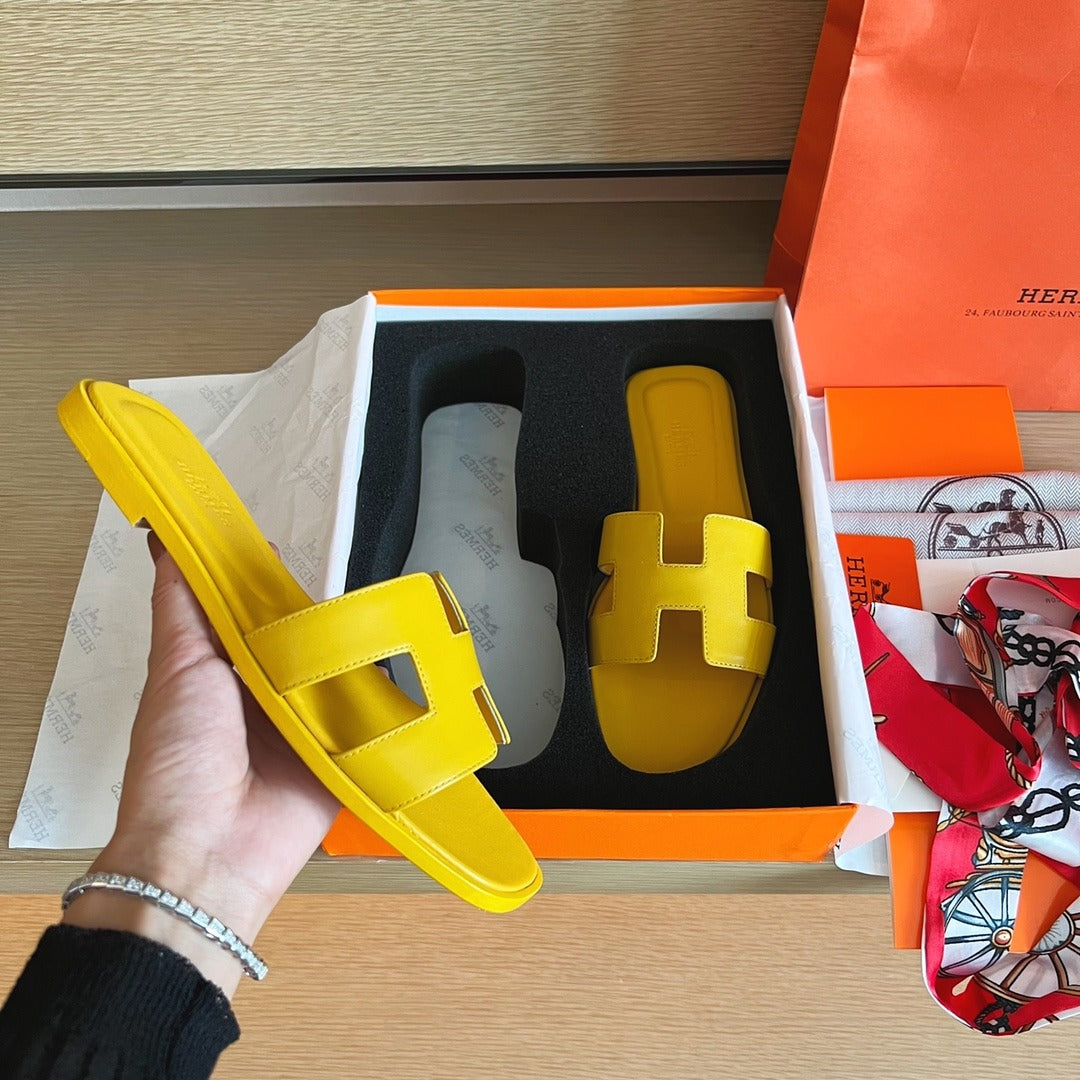 Hermès Oran Sandals in Yellow Leather with Iconic H Cut-Out