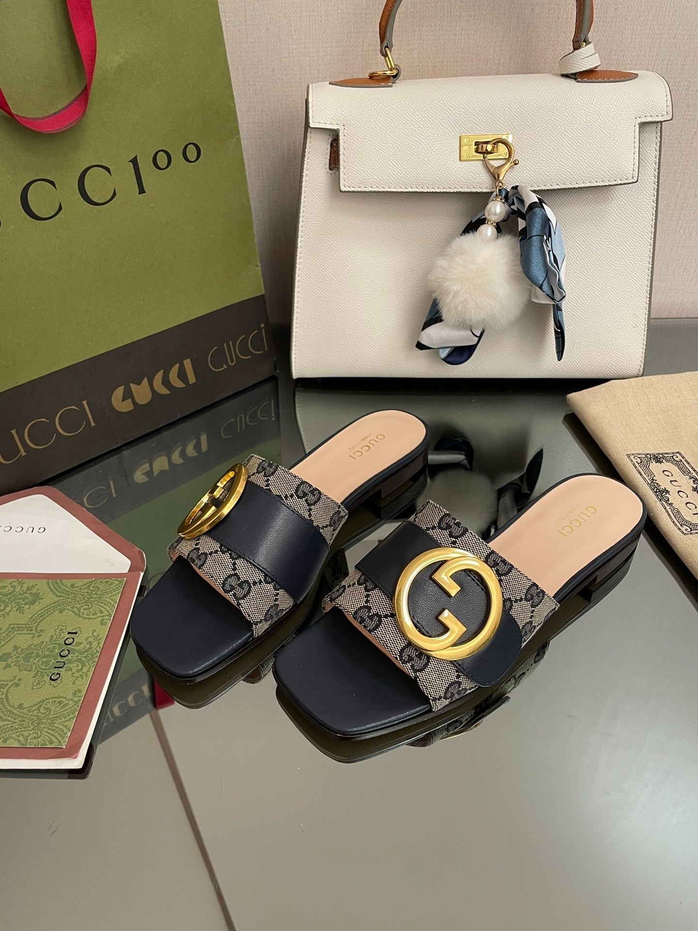 Gucci GG Canvas & Navy Leather Interlocking G Logo Mules