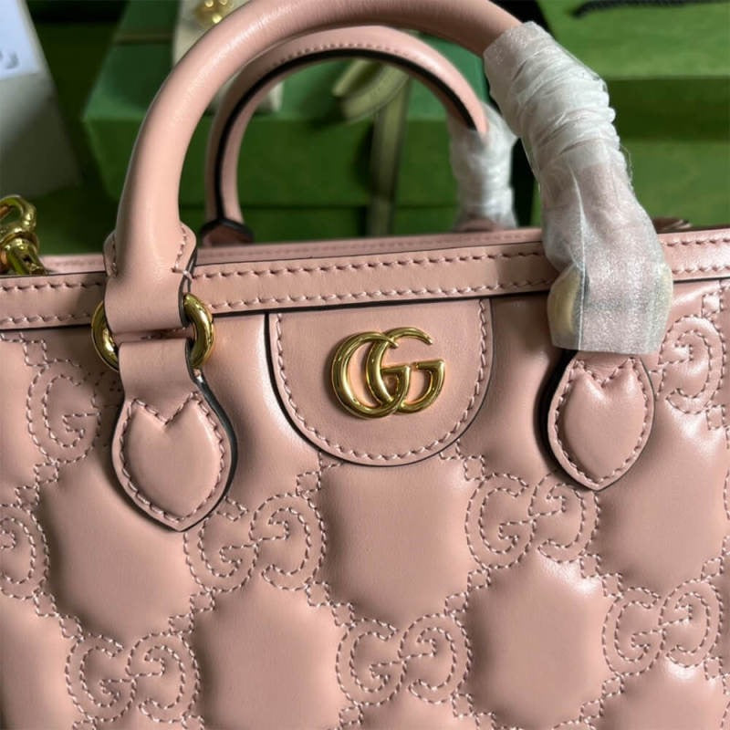 GG matelassé mini top handle bag