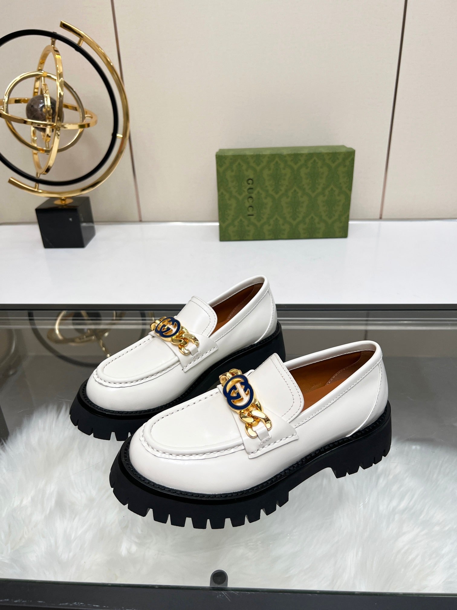 Gucci White Leather Lug Sole Loafers with Interlocking G Chain Detail