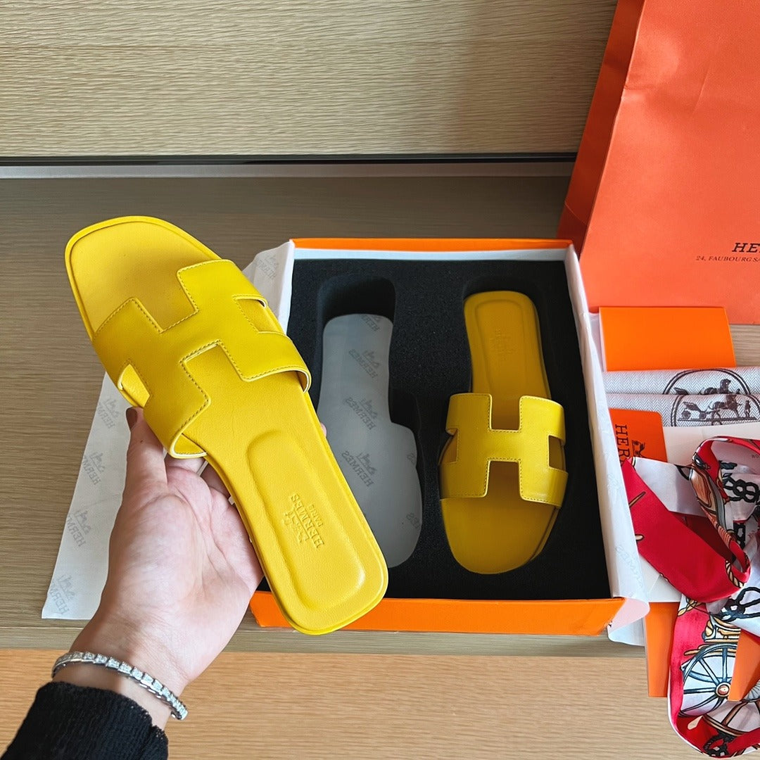 Hermès Oran Sandals in Yellow Leather with Iconic H Cut-Out