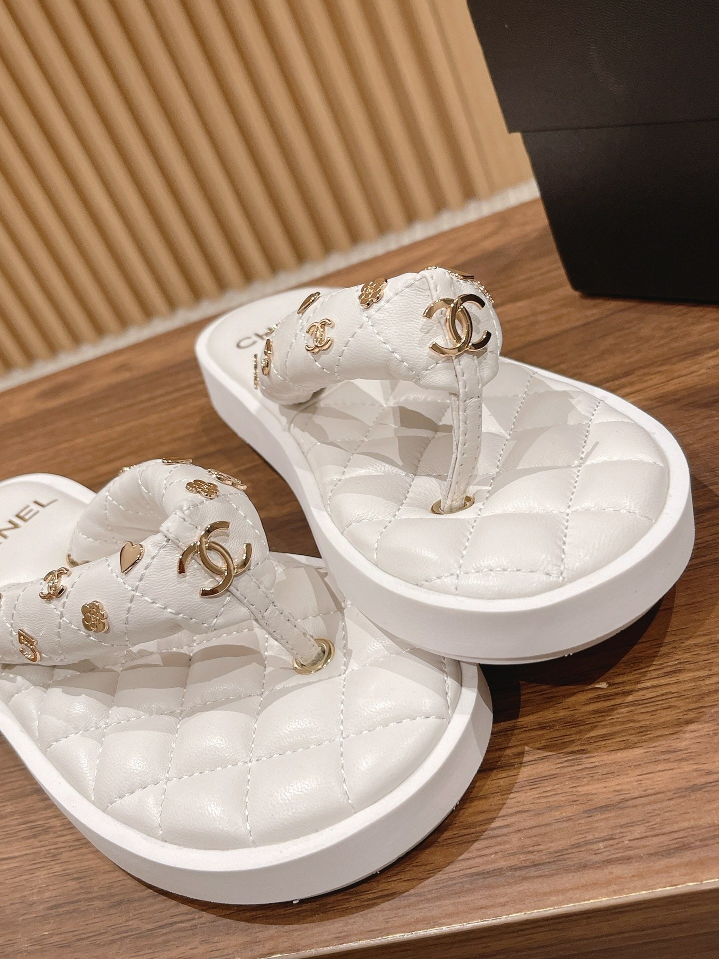 Chanel White Quilted Thong Sandals with Gold CC Charms