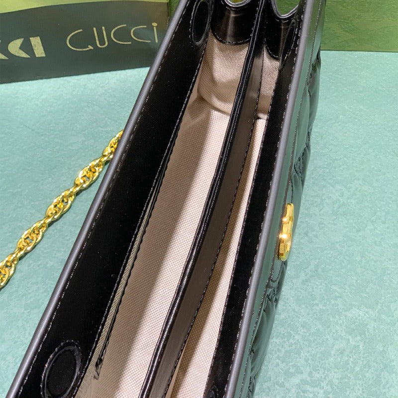 GG Matelassé leather small bag