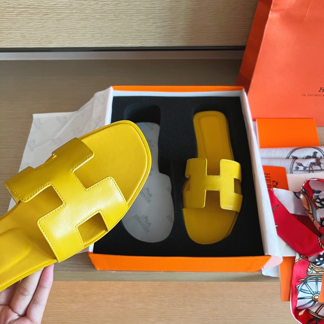 Hermès Oran Sandals in Yellow Leather with Iconic H Cut-Out