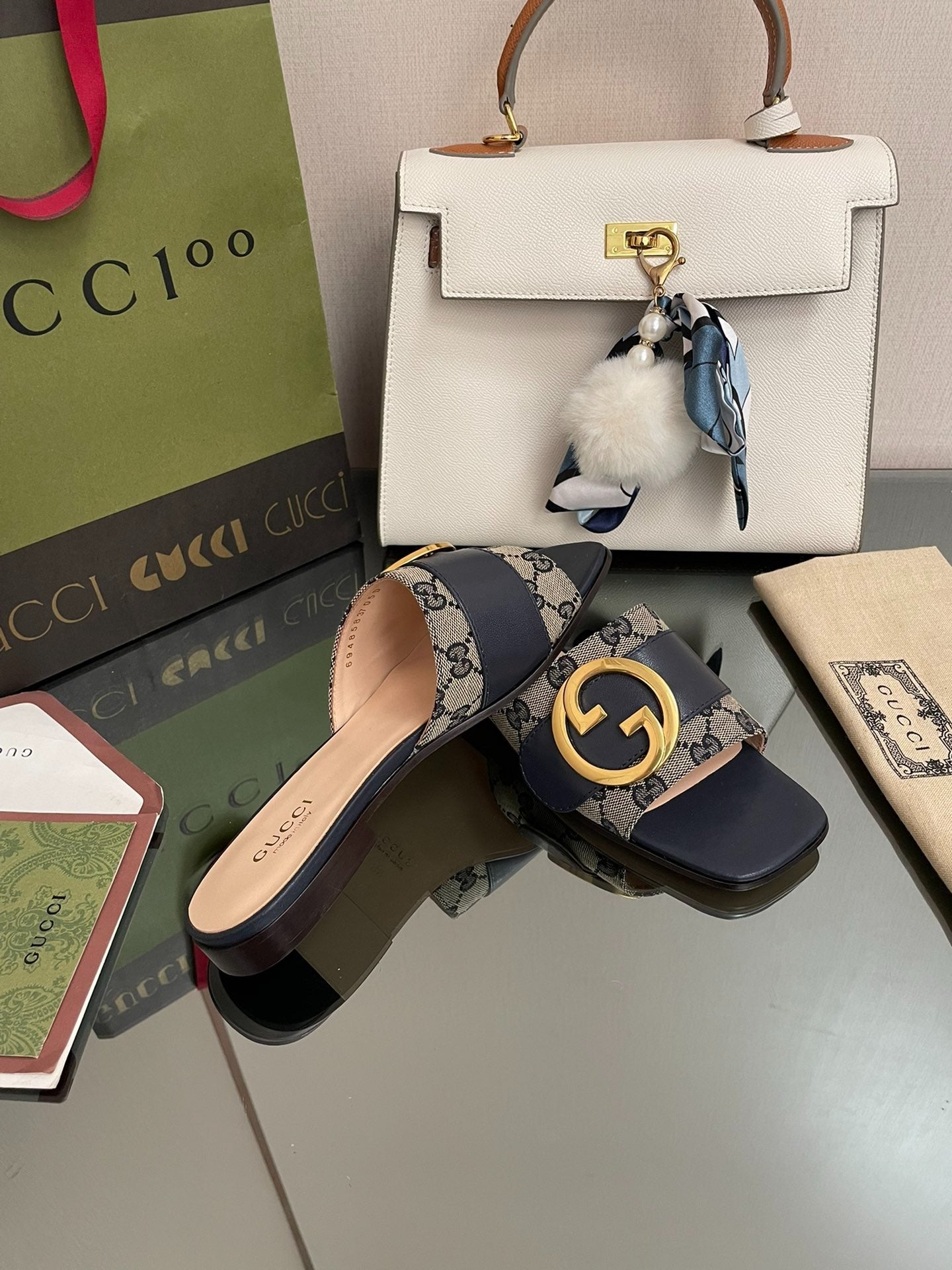 Gucci GG Canvas & Navy Leather Interlocking G Logo Mules